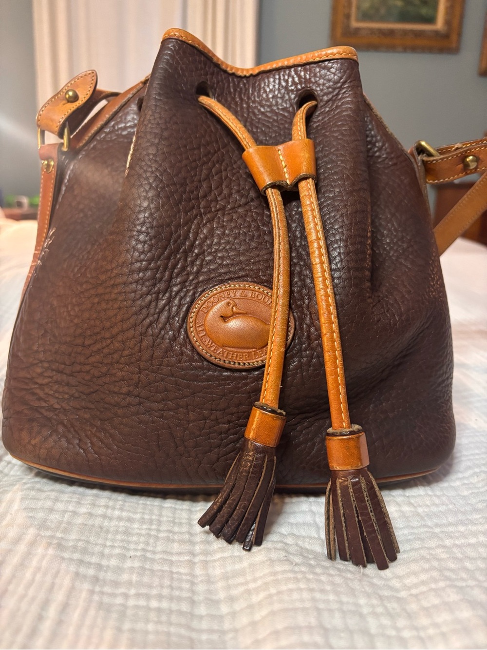 Vintage Dooney & Bourke All-Weather Leather Drawstring Bag brown and tan